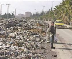 الهلال الأحمر القطري: تراكم النفايات في حلب ينذر بكارثة بيئية