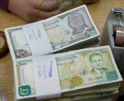 تبديل العملة .. مقامرة جديدة في الاقتصاد السوري