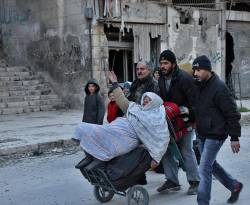 عدد مغادري أحياء حلب المحاصرة تجاوز 14 ألفاً منذ بدء الإجلاء