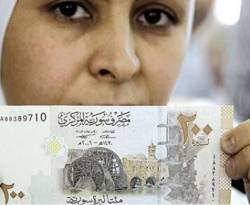 لماذا لا تزال العملة المحلية متداولة في كل الأراضي السورية؟