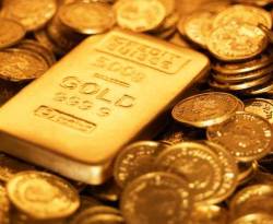 عالمياً: الذهب يغلق مرتفعا لكنه ينهي الأسبوع على خسارة مع صعود الدولار