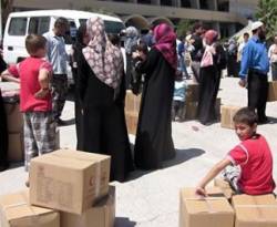 جمعيات خيرية في الأردن تبتز اللاجئين السوريين قبل التسجيل فيها !
